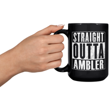 Straight_Outta_Ambler_Mug_15oz_Black_LH_Model_Mockup.png
